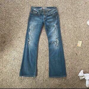 distressed low rise jeans